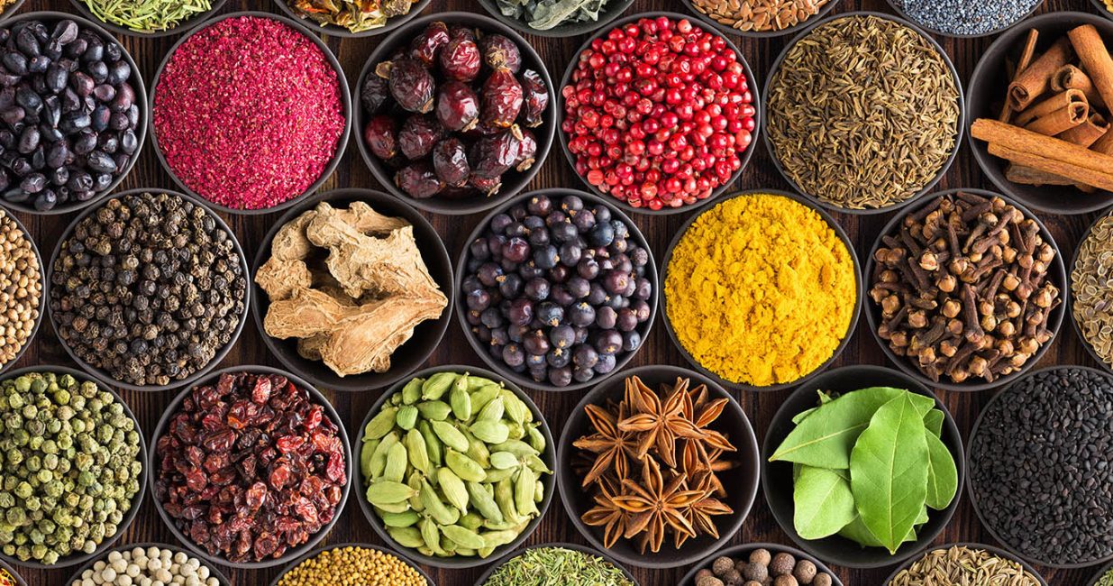 Bright spice background, top view. Collection  seasoning and herbs of Indian food